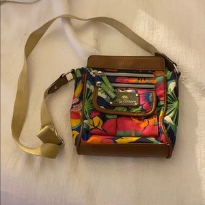 Cross body lily bloom purse .